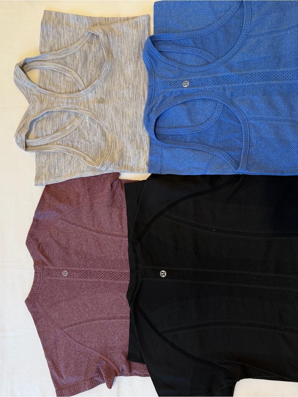 lululemon Racerback Tank Tops in Blue & Gray; Short Sleeve in Black & Burgundy